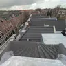 DG Dakwerken, pannendak in een woonwijk
